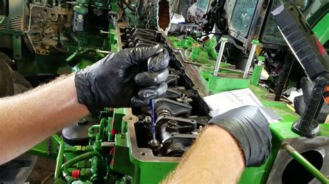 The relief valve is tucked in right between the loader SCV and the transmission. . John deere valve adjustment